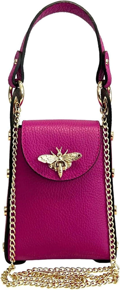 Purple handbag with gold chain and bee emblem on a white background