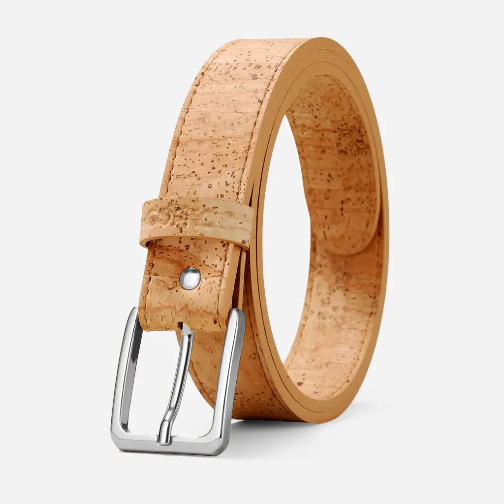 The Corkor Womens Cork Belt – 30mm with Silver Buckle, in light tan eco-friendly cork, is shown rolled-up and upright against a plain white background.