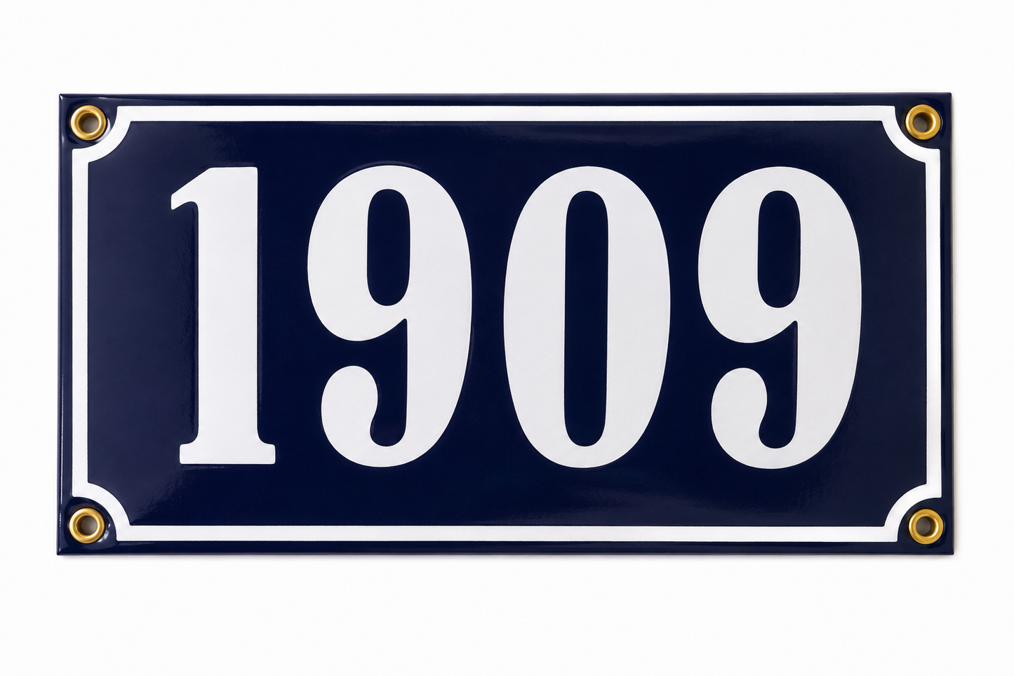 A handmade navy blue rectangular Enamel House Number sign by Luis Filipe, crafted in Portugal, featuring the bold white numbers "1909" and finished with four gold rivets in each corner.