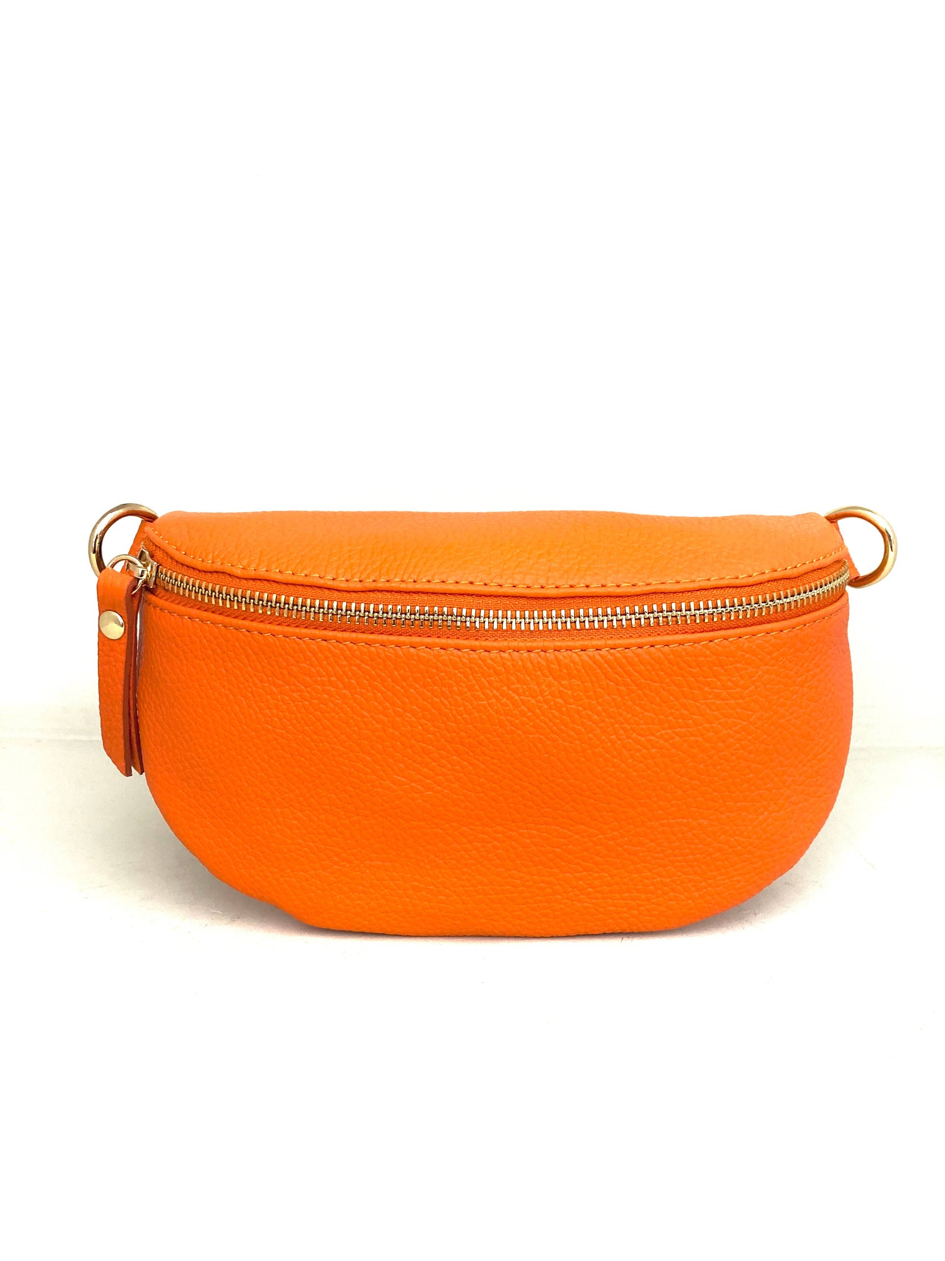 Cassette fanny pack/crossbody in tangerine Italian leather with gold zip and matching strap, front view on white.