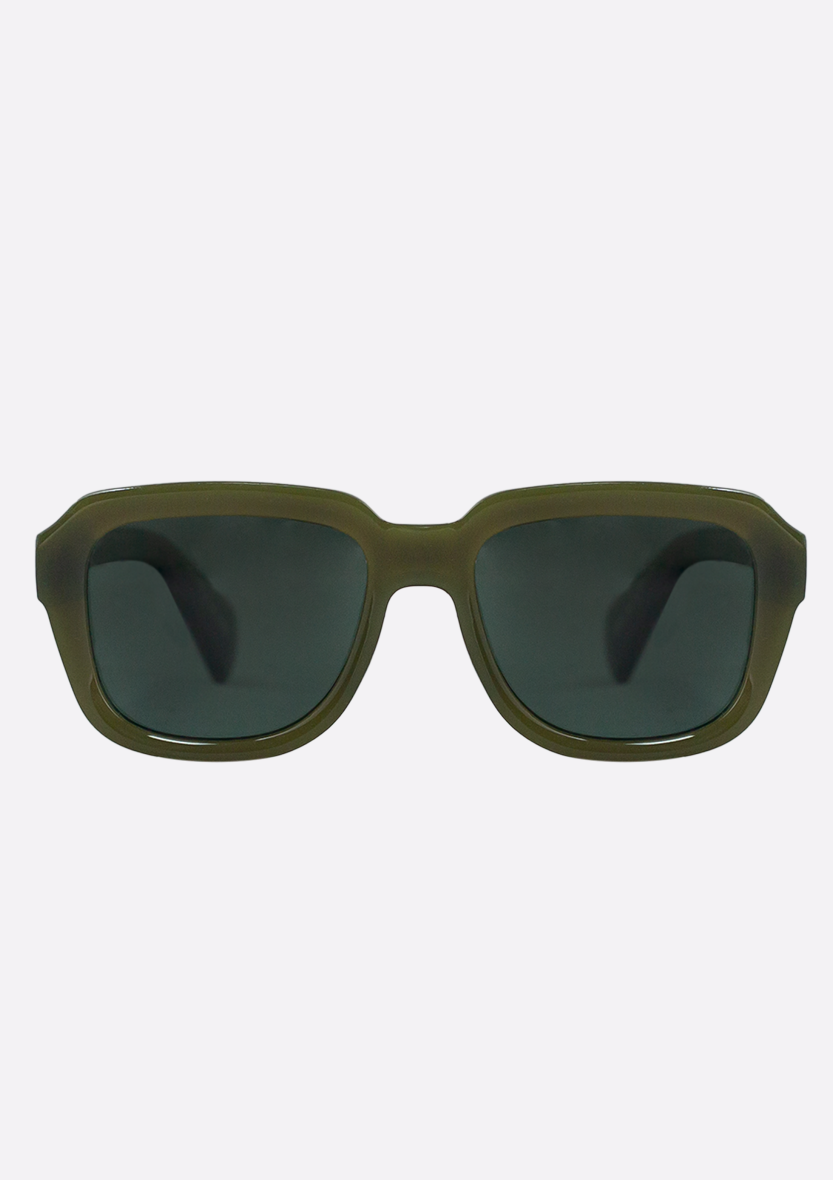 The Petrea Low Verde Sunglasses by Oceanides feature an olive green rectangular frame made from recycled plastic and dark polarized lenses, shown front-facing against a plain white background.