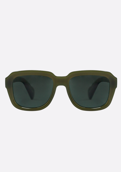 The Petrea Low Verde Sunglasses by Oceanides feature an olive green rectangular frame made from recycled plastic and dark polarized lenses, shown front-facing against a plain white background.