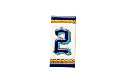 Rectangular LVR Ceramics Marine Ceramic House Number & Letter Tile featuring the number two in a stylized blue font, bordered by decorative orange rope motifs and dark blue stripes.