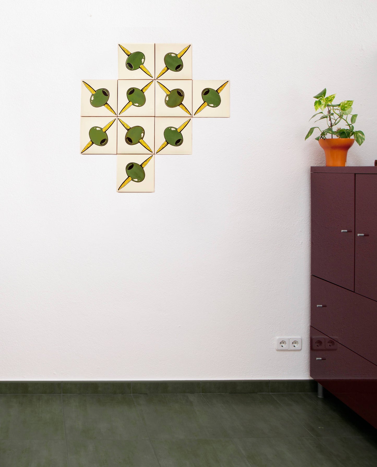 Close-up detail of olive motif on self-adhesive ceramic tiles