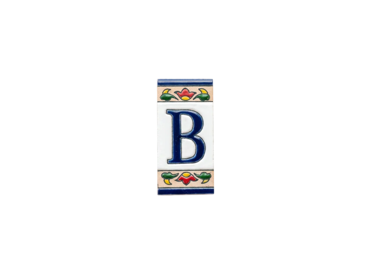 Mini Chilli Ceramic House Number & Letter Tile featuring the letter B in blue on a rectangular handcrafted Spanish tile, bordered by decorative bands with red and green chili pepper motifs.