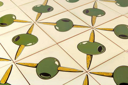 Angled view of Spanish olive branch ceramic tiles with self-adhesive backing