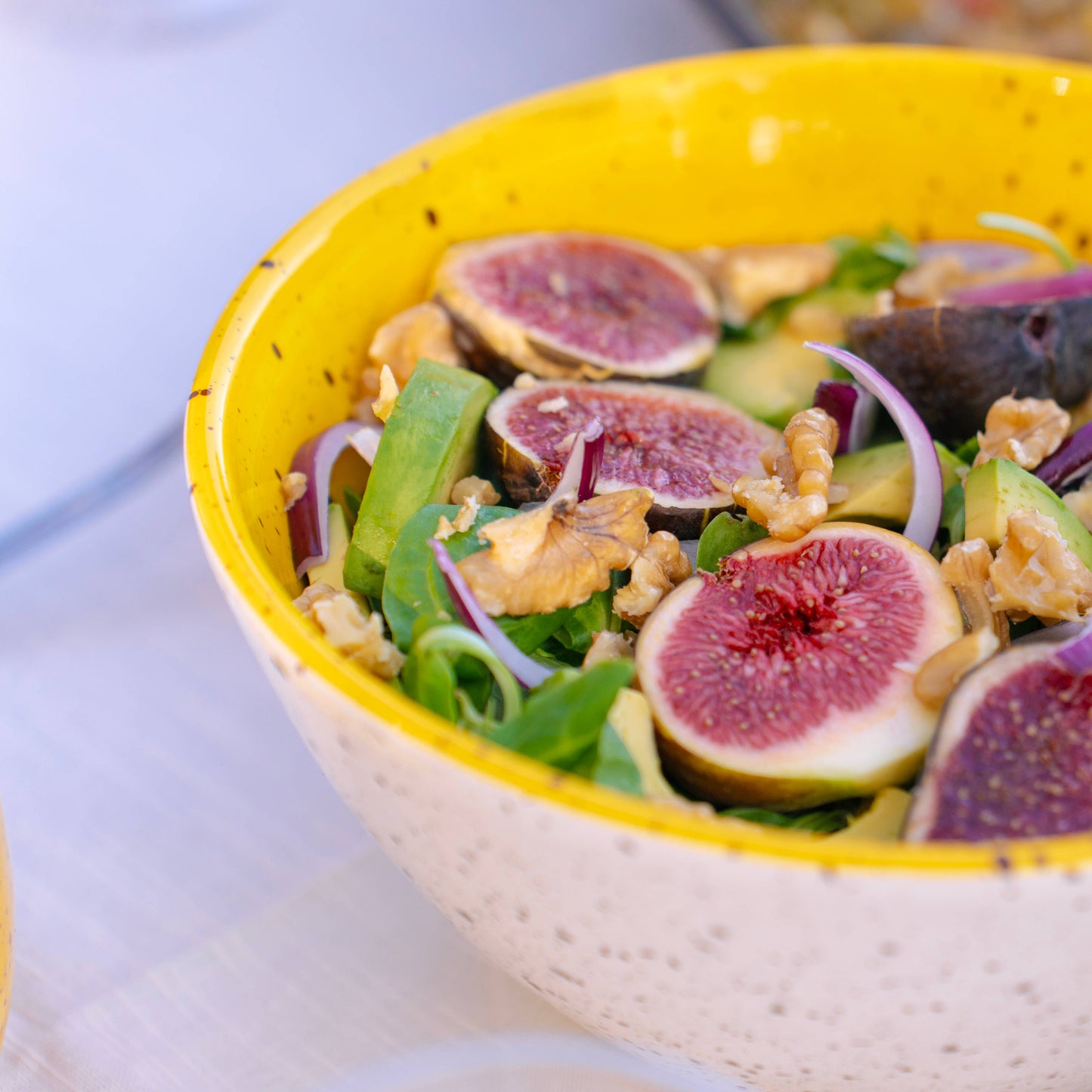 Ceramic Spanish Bowl with yellow interior with Fig and Walnut salad
