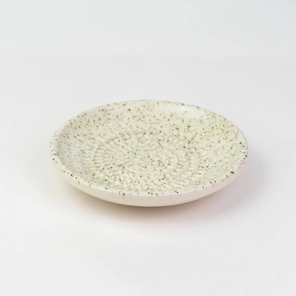 ceramic Granite grater plate in white with green flecks