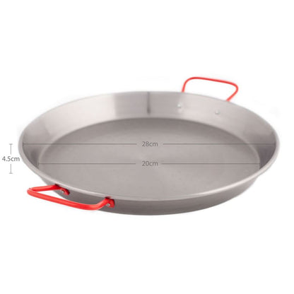 paella pan with polished steel and red handles