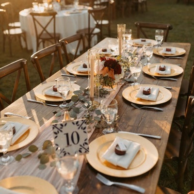 wedding table decorated with serving ware and ceramic tile 