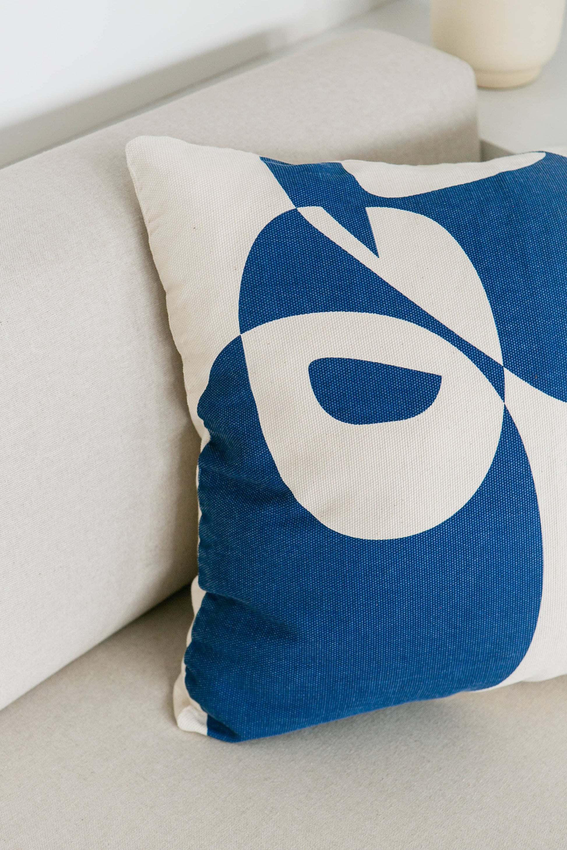 modern drawn blue and white pillow 