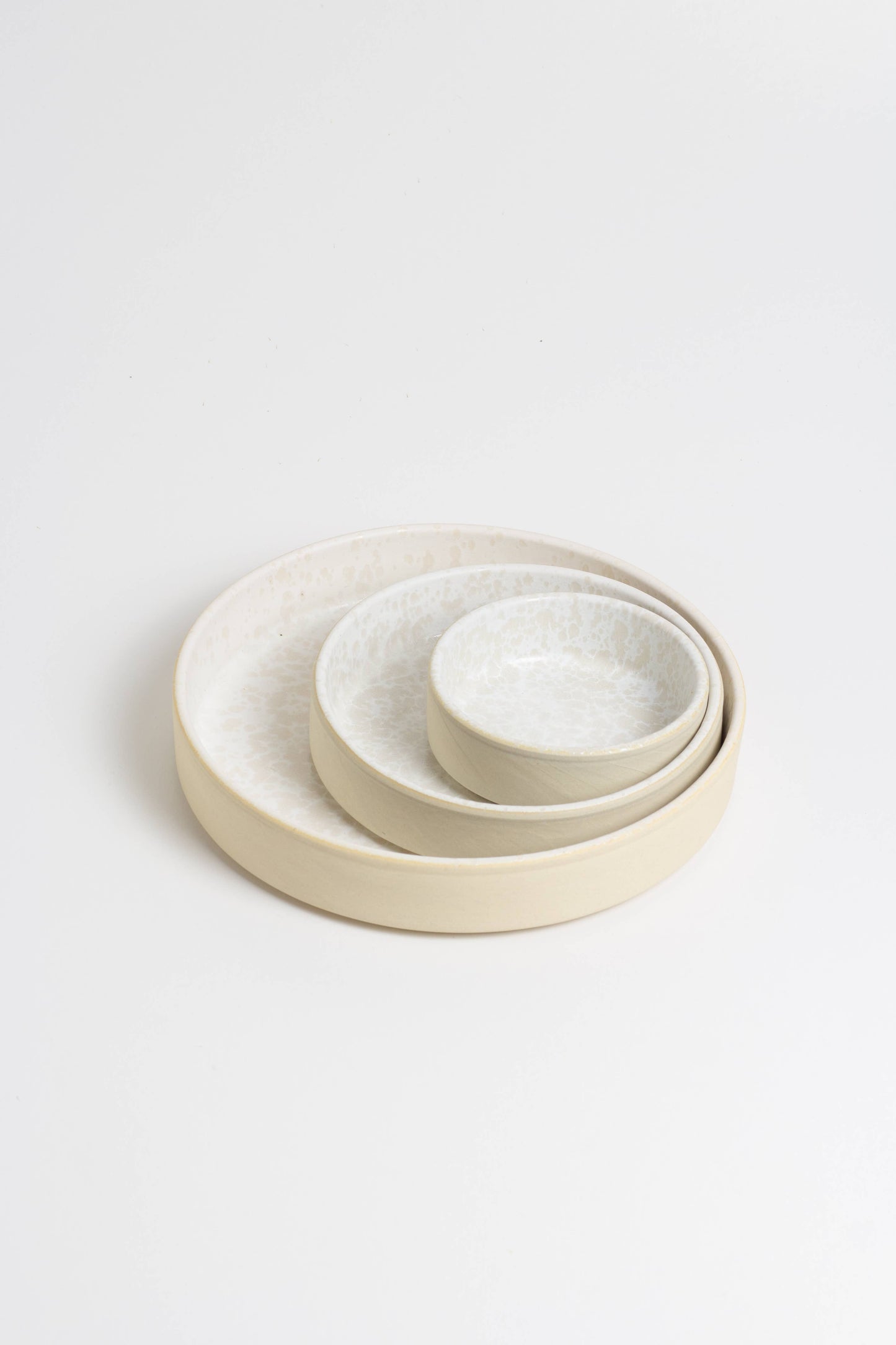 Set of Beige ceramic plates iberica