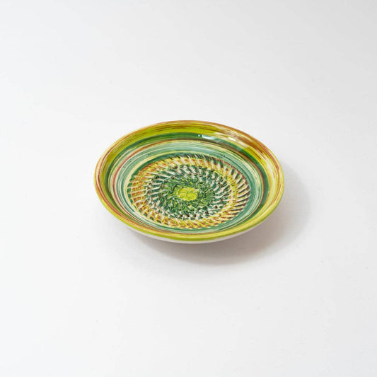green and spiral colored grater plate